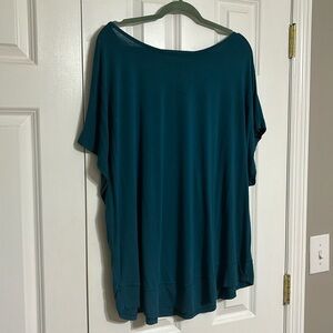 Easel teal colored top. Super cute crisscross back design. Very comfortable.